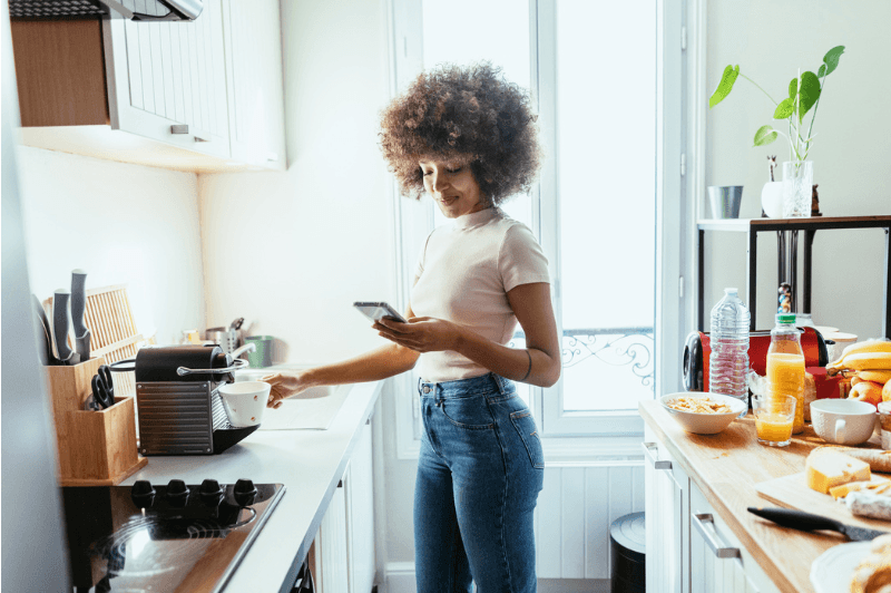 AI 2025 - Woman in Kitchen getting coffee