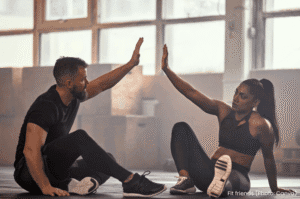Fitness: friends high-five after a workout