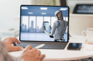 AI concept - robot on laptop screen