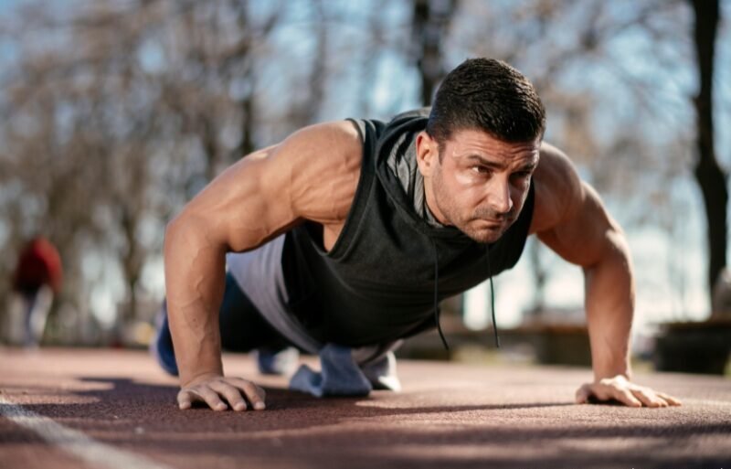 Man working out - fitness trend.