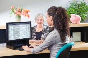 A bank teller assisting a customer