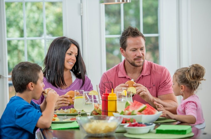 Young family having a meal together