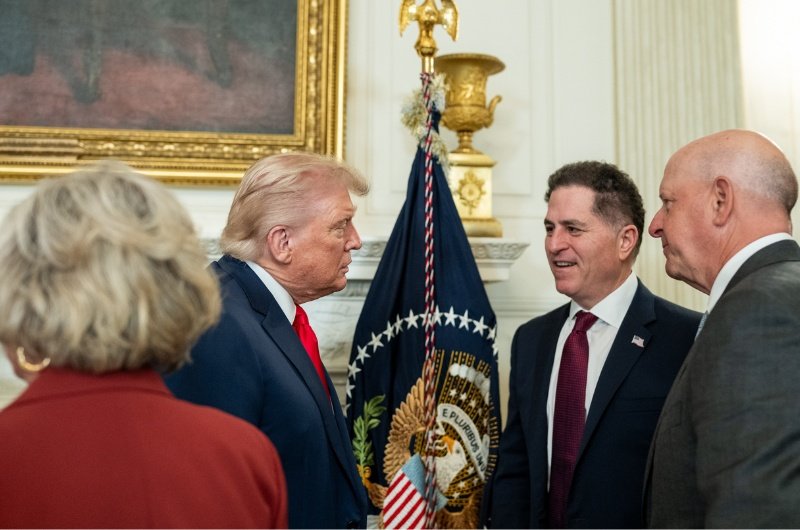 President Donald Trump speaks with Michael Dell at the Invest America Roundtable.
