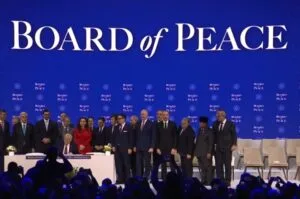 President Trump signs the Board of Peace agreement during a formal ceremony in Switzerland, launching a new U.S.-led foreign policy initiative.