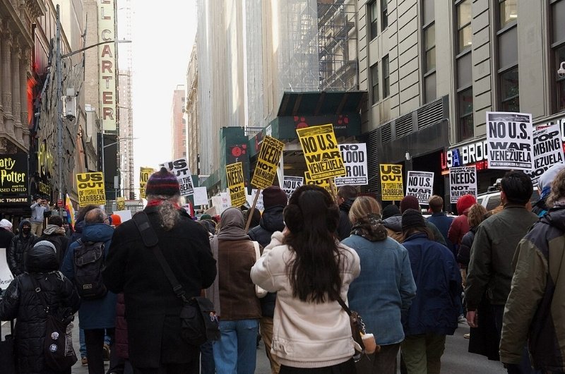 Protestors gather in Times Square against the invasion of Venezuela and kidnapping of Nicolás Maduro by the U.S.