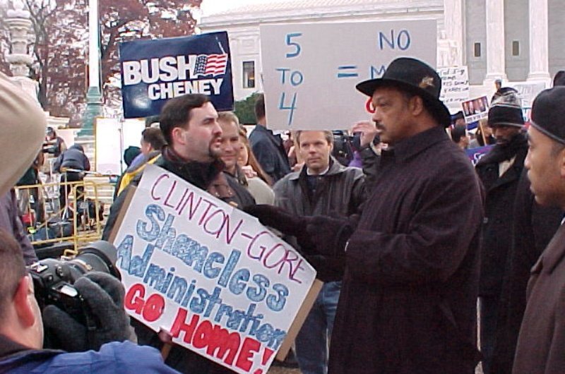 Rev. Jesse Jackson and a Bush supporter during 2000 Presidential election recount on the Supreme Court Plaza.