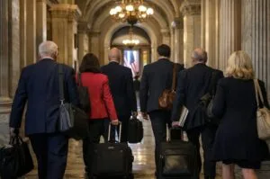 Members of Congress exit the Capitol as DHS funding expires, setting the stage for a potential weekend shutdown.