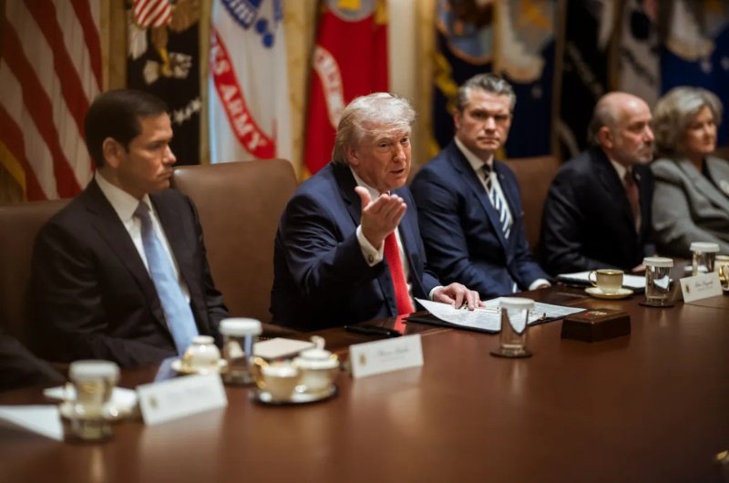 President Donald Trump participates in a Cabinet meeting at the White House as U.S. officials continue diplomatic efforts related to the Middle East.