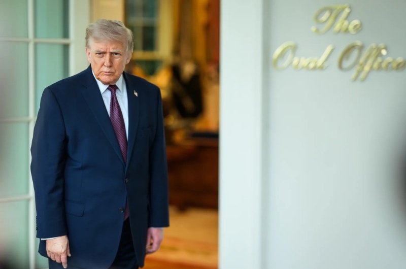 President Donald Trump stands outside the Oval Office as the administration moves toward launching a tariff refund portal that could return billions to U.S. businesses.