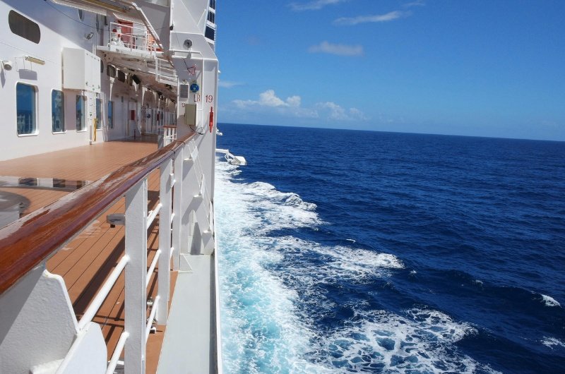 A deck aboard a cruise ship is empty as health officials investigate a cluster of hantavirus cases linked to a South Atlantic voyage.