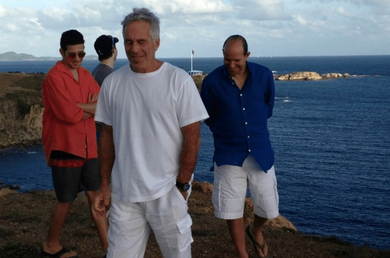 Jeffrey Epstein and Howard Lutnick, in blue shirt and white shorts.
