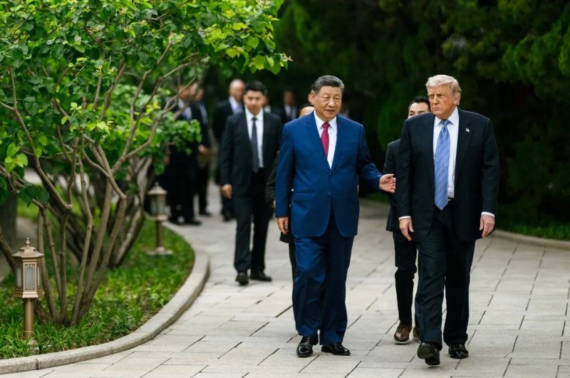 President Donald Trump and Chinese President Xi Jinping walk together following high-level bilateral talks during a summit focused on trade, manufacturing, and global security issues.