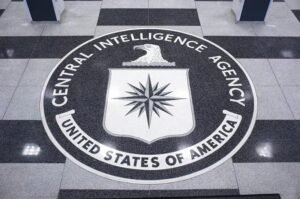 The seal of the Central Intelligence Agency at its headquarters, reflecting the agency's role in gathering and analyzing foreign intelligence.