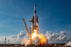 A SpaceX Falcon 9 rocket lifts off during a mission. The company's scheduled addition to the Nasdaq-100 marks another milestone following its historic public debut.