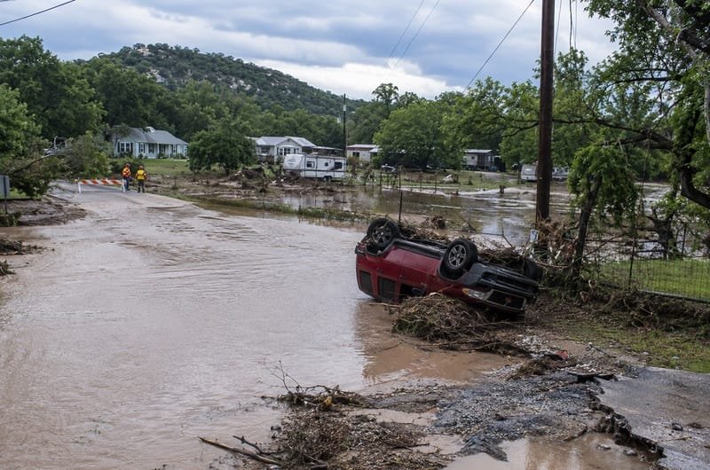Floodwaters cover a residential area in the Texas Hill Country after more than two feet of rain fell in parts of the region.