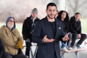 Abdul El-Sayed speaks with voters during his campaign for Michigan’s open U.S. Senate seat.