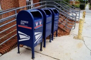 U.S. Postal Service mailboxes. A federal judge has temporarily blocked new mail-voting restrictions from taking effect ahead of the November midterm elections.
