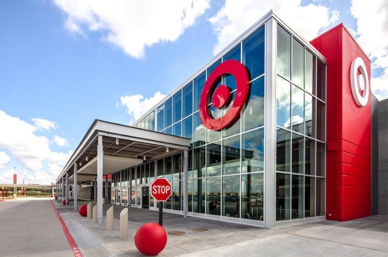 A Target store exterior. The retailer raised its full-year sales outlook as customer traffic and digital sales improved during the latest quarter.