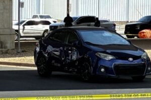 Bullet holes are visible in the vehicle driven by Wilber Rafael Garces Perez after he was shot and wounded by an ICE agent during an immigration operation in Austin, Texas.